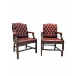 Pair of George III style library open armchairs