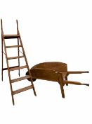 Rustic fruitwood wheel barrow (L162cm) together with a vintage five rung step ladder (H177cm)