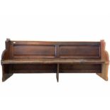 Large late 19th century stained pine church pew