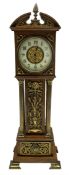 An Edwardian oak miniature longcase clock with a broken pediment and central brass finial