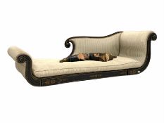 Regency ebonised chaise longue of scrolling form