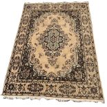 Persian design English beige ground rug centred by floral medallion 380cm x 280cm