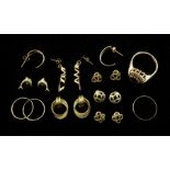 Eight pairs of gold stud earrings