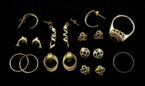 Eight pairs of gold stud earrings