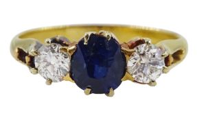 21ct gold three stone oval sapphire and round brilliant cut diamond ring