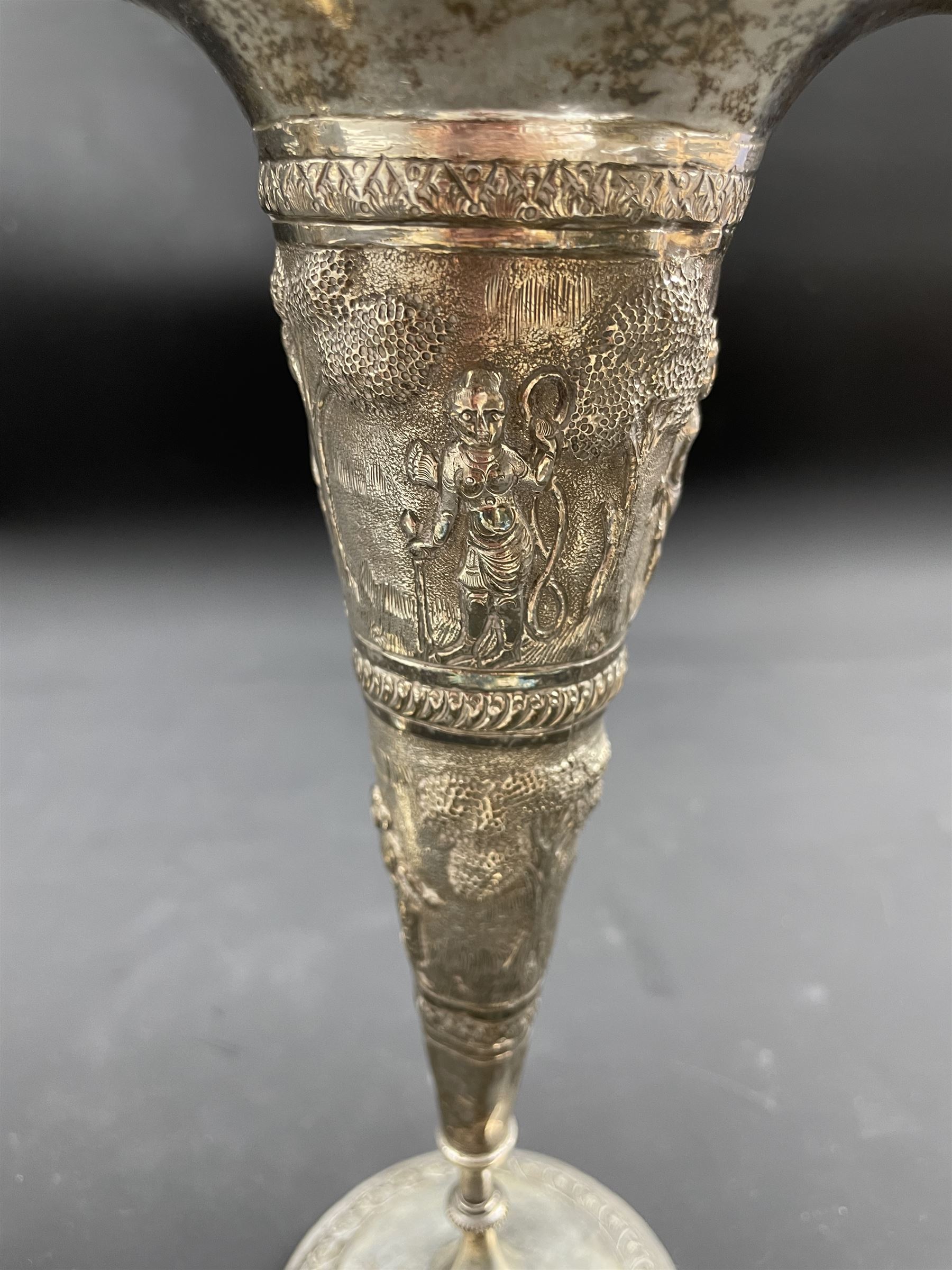 Pair of Indian White Metal trumpet shape vases with embossed decoration of figures and landscapes ma - Image 2 of 3