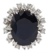 18ct white gold oval sapphire and round brilliant cut diamond cluster ring