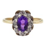 Gold oval amethyst and diamond chip cluster ring