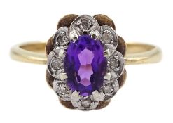 Gold oval amethyst and diamond chip cluster ring