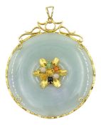 Gold circular jade pendant with central gold and stone set decoration