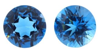 Two loose large round blue topaz's