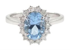 18ct white gold oval aquamarine and diamond cluster ring