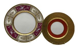 Mid 20th century Minton plate decorated with three pâte-sur-pâte panels of birds on a cerise ground