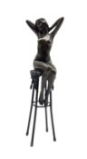 Art Deco style bronze modelled as a female figure seated upon a chair