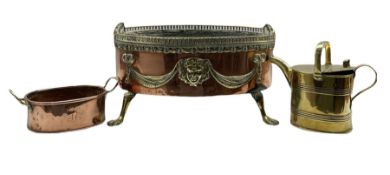 Regency design brass and copper oval planter with pierced gallery edge on paw feet W49cm