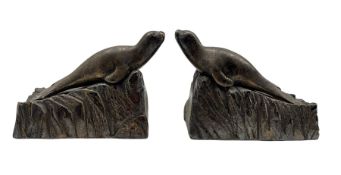 Pair of 1930's French silvered bronze bookends in the form of Seals with ruby glass eyes