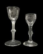 18th century cordial glass with ogee bowl and etched with Jacobite white rose and butterfly on a cot