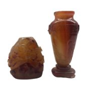 19th century Chinese carnelian vase carved with carp and masks on an oval foot H11cm and a carneli