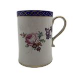 18th century Derby mug painted with sprays of flowers within a blue and gilt border and with loop ha