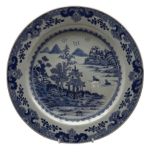 18th century Chinese export plate decorated in blue and white with buildings