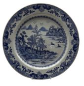 18th century Chinese export plate decorated in blue and white with buildings