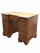 Edwardian mahogany breakfront knee hole desk