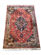 Persian design red ground rug