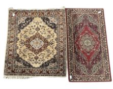 Persian design beige ground rug with floral decoration and multi line border (165cm x 136cm) togethe