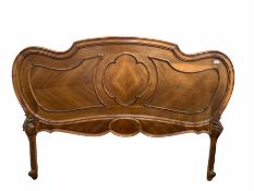 Early 20th century French walnut headboard of lobed oval design