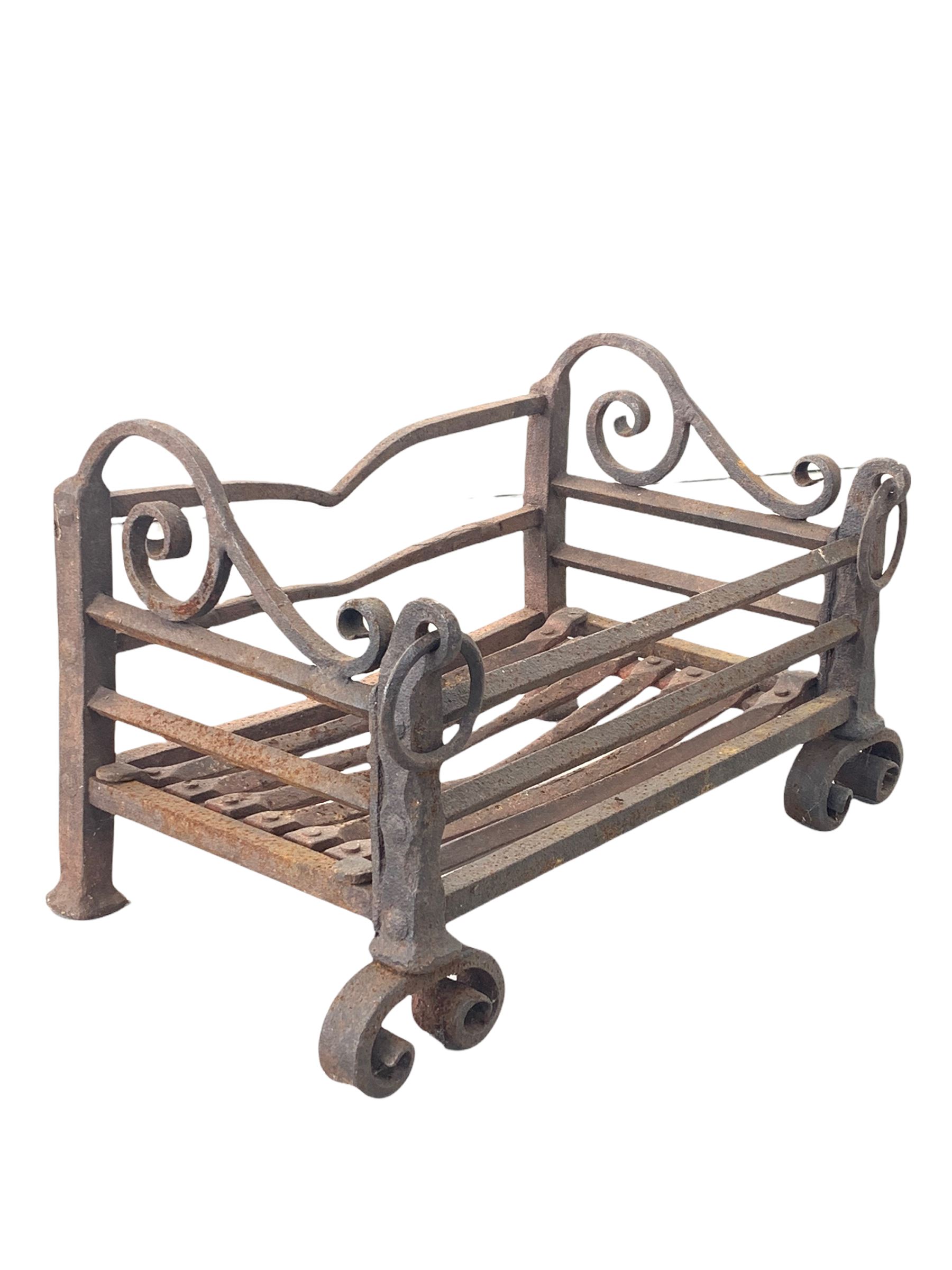 Small 19th century blacksmiths made wrought iron dog grate