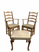 Pair of Ercol ladder back carver chairs with upholstered squab cushions