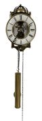 A German 20th century chain driven hanging wall clock with a visible skeletonised movement and 6� op