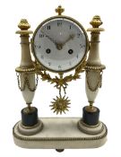 A 19th century French striking mantle clock in a white marble portico case with gilt brass mounts an