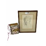 Unsigned head and shoulders pencil portrait of a lady and a small Victorian photograph album in moth