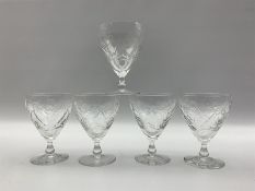 Five Edinburgh crystal wine glasses cut with flowers and thistles