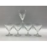 Five Edinburgh crystal wine glasses cut with flowers and thistles