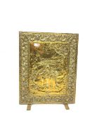 Embossed brass fire screen