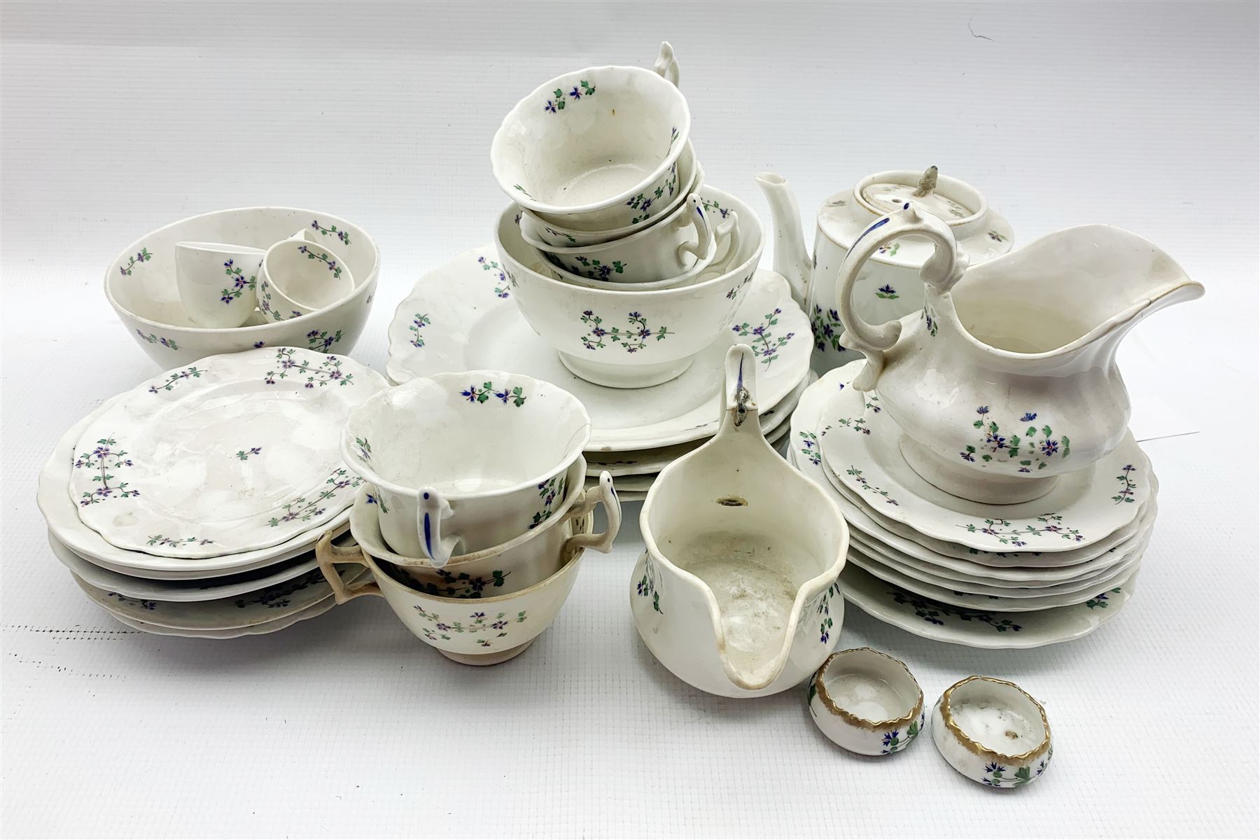19th century French tea set decorated with floral sprigs 33 pieces