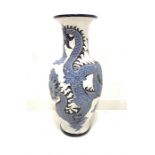 Large Chinese ceramic vase decorated with dragons