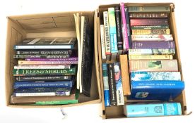 Two boxes of books on travel