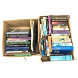 Two boxes of books on travel