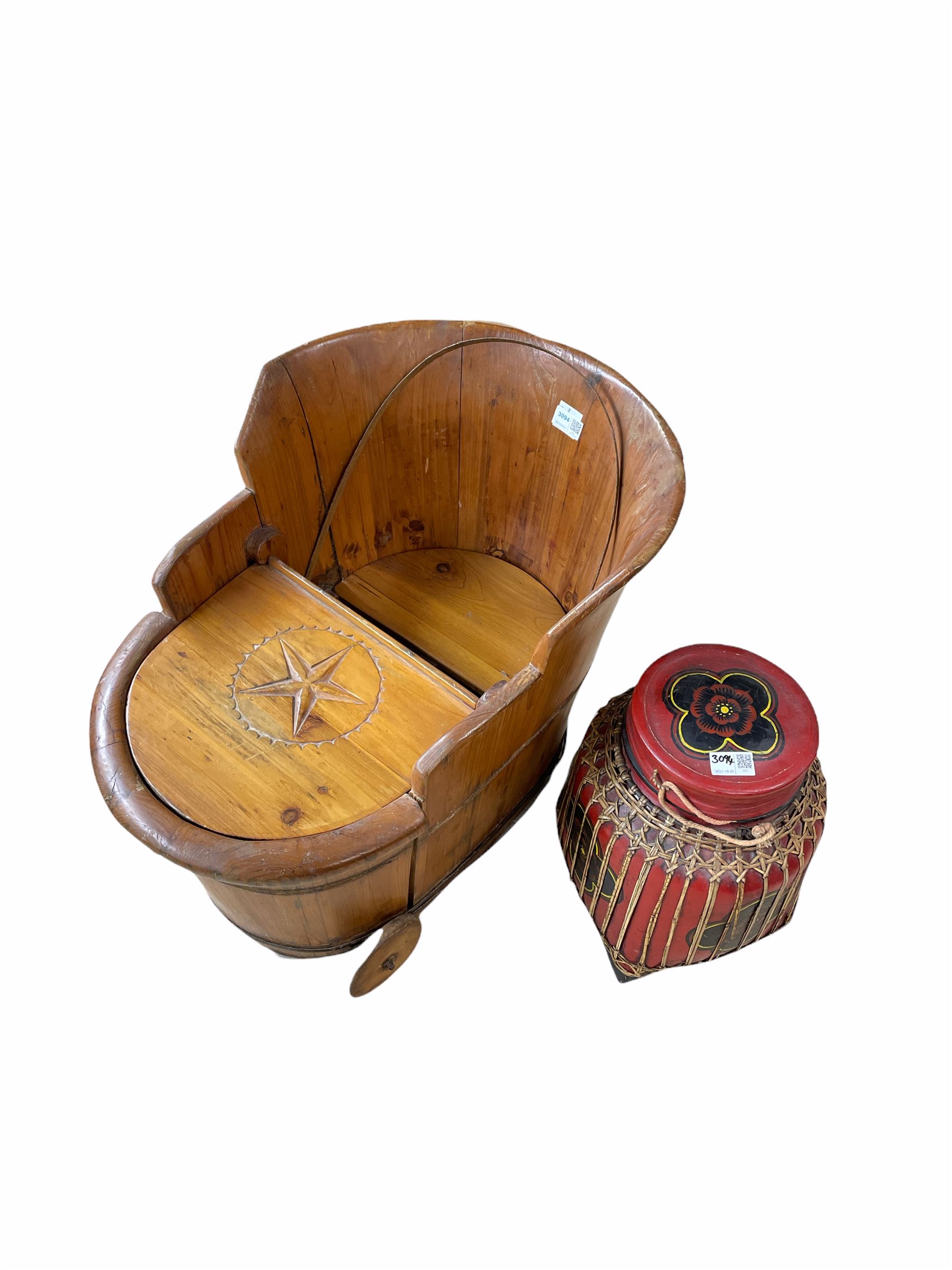 A Children's softwood push along cart and a red lacquer jar and cover (2)