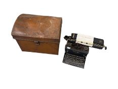 Imperial typewriter and a painted metal trunk