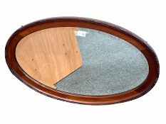 Early 20th century mahogany framed oval wall mirror with bevelled plate 78cm x 48cm