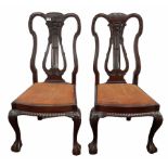 Pair of mahogany lyre back dining chairs with drop in upholstered seat pads and ball and claw front