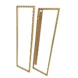 A pair of wall hanging gilt mirrors. 34cm x 120cm