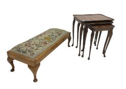 Nest of Walnut occasional tables together with and an Oak tapestry stool with needlework top