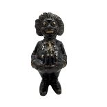 Cast Iron Golly money box H16cm. Originally handmade by mothers in Africa for their children from