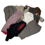 Vintage women's clothing including a tweed jacket and skirt