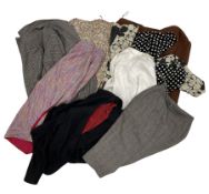 Vintage women's clothing including a tweed jacket and skirt